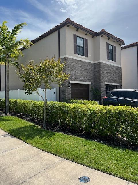 2999 Butternut Lane Riviera Beach, FL 33410 - Photo 4 of 52 Side of house