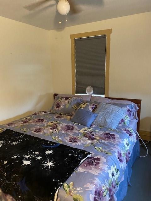 1153 Church Street Indiana, PA 15701 - Photo 8 of 11 a bed sitting in a bedroom next to a bathroom