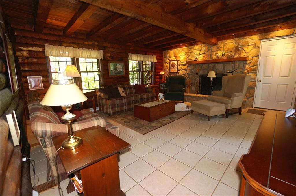 45 Dovercrest Road Eighty Four, PA 15330 - Photo 13 of 25 What a beautiful room! Stone fireplace with raise tarts surrounded by a stone wall. It feels like youre in a mountain vacation home?