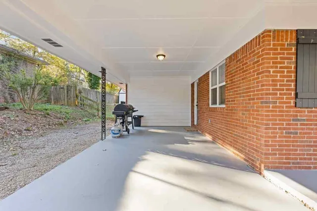 a view of chair and tables in the patio