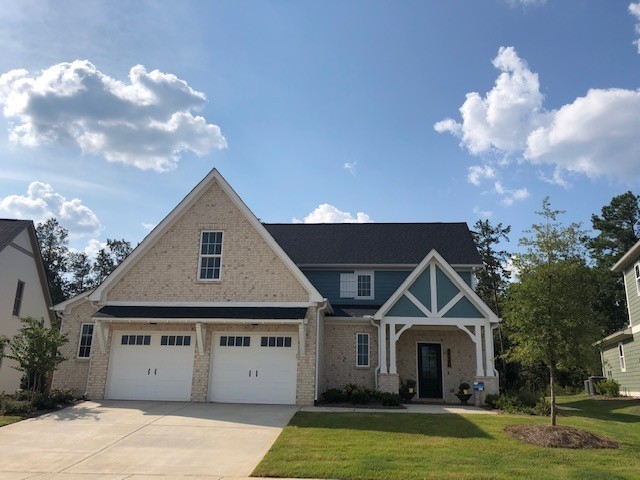 1019 Fallow Road, Unit 812 Mount Juliet, TN 37122 - Photo 1 of 23 a front view of a house with garden
