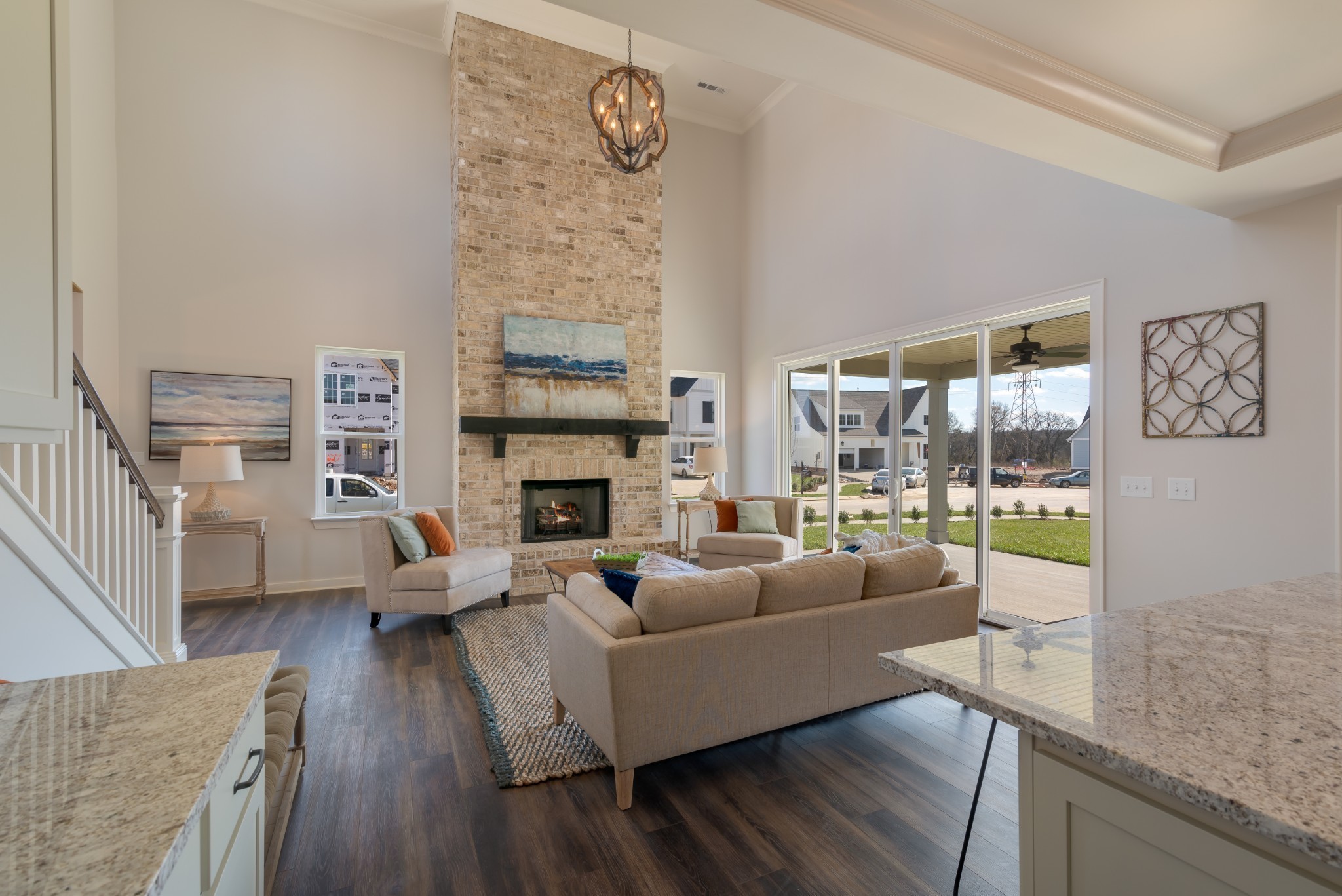 1019 Fallow Road, Unit 812 Mount Juliet, TN 37122 - Photo 9 of 23 a living room with furniture a fireplace and a large window