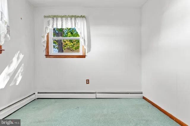 an empty room with window