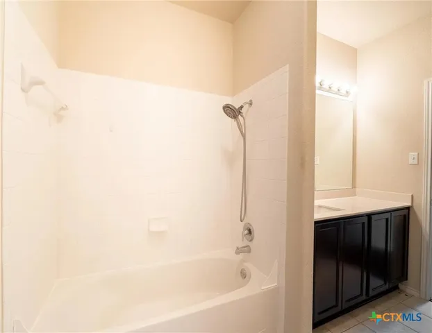 a bathroom with a bathtub