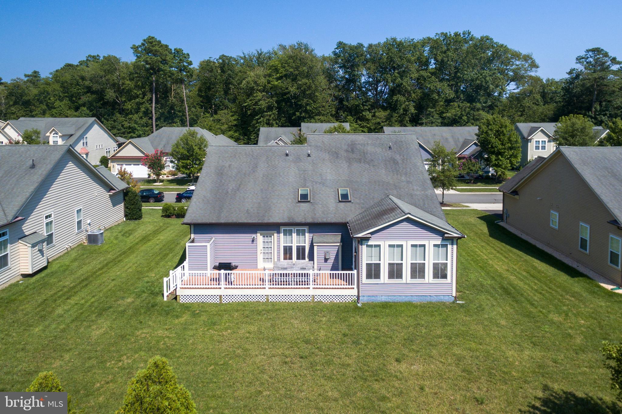31762 Skimmer Road Ocean View, DE 19970 - Photo 6 of 52 Spacious Deck and Yard in Reaf