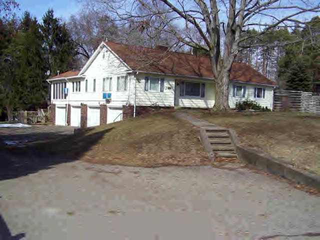 114 Main Street Franklin, PA 16323 - Photo 1 of 1 a front view of a house with a yard