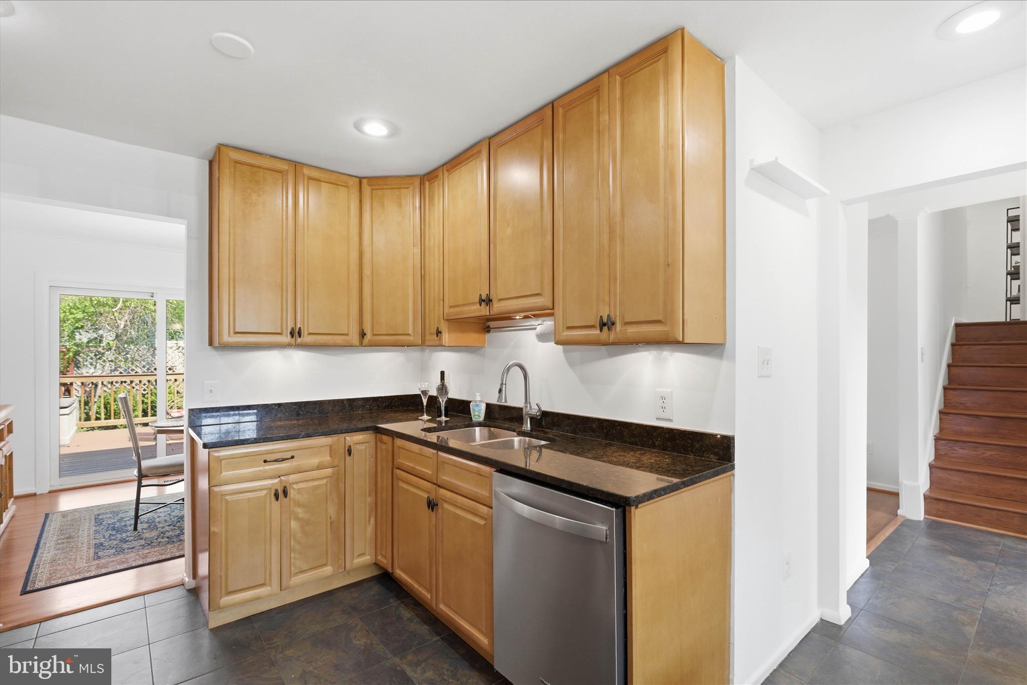 2510 Swift Run Street Vienna, VA 22180 - Photo 12 of 42 a kitchen that has a sink and a stove in it