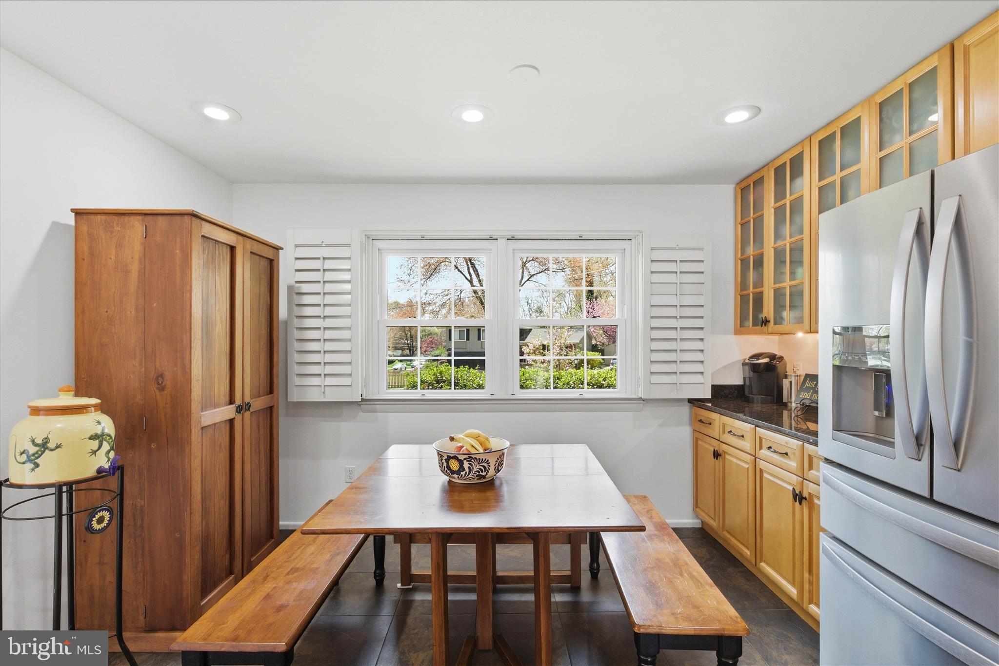 2510 Swift Run Street Vienna, VA 22180 - Photo 15 of 42 a kitchen with stainless steel appliances granite countertop a refrigerator a stove a sink dishwasher and microwave with wooden floor