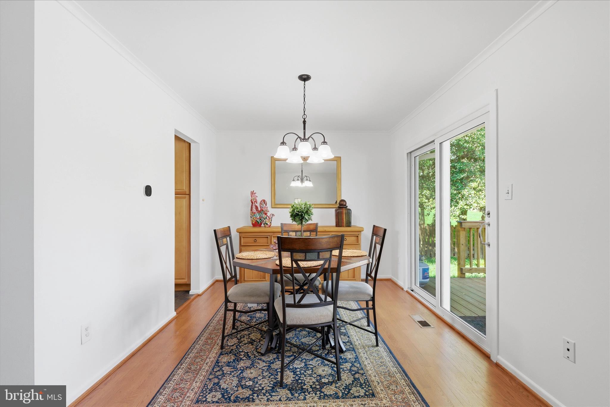 2510 Swift Run Street Vienna, VA 22180 - Photo 17 of 42 a dining room with furniture window and outside view