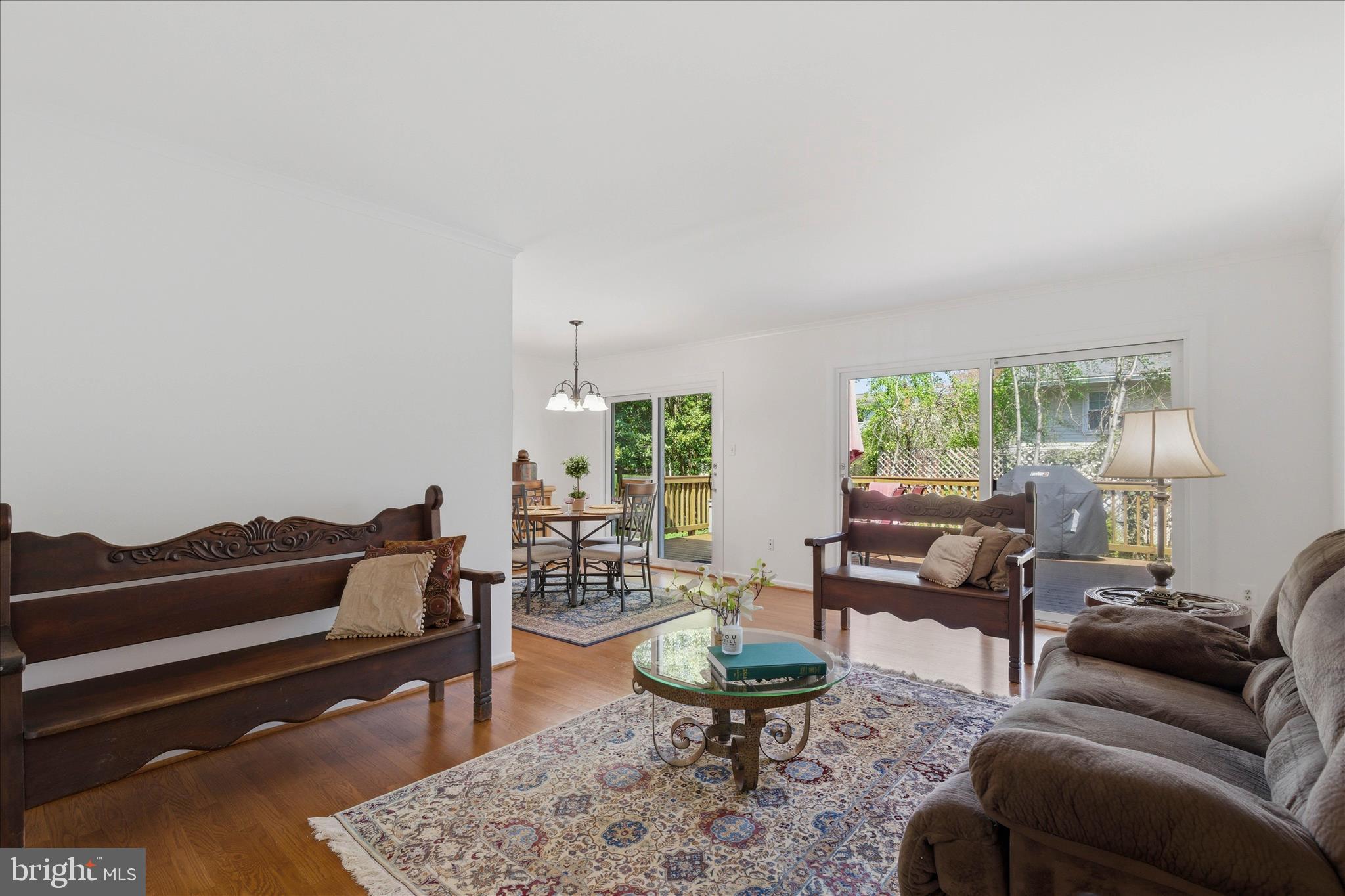 2510 Swift Run Street Vienna, VA 22180 - Photo 18 of 42 a living room with furniture and a wooden floor