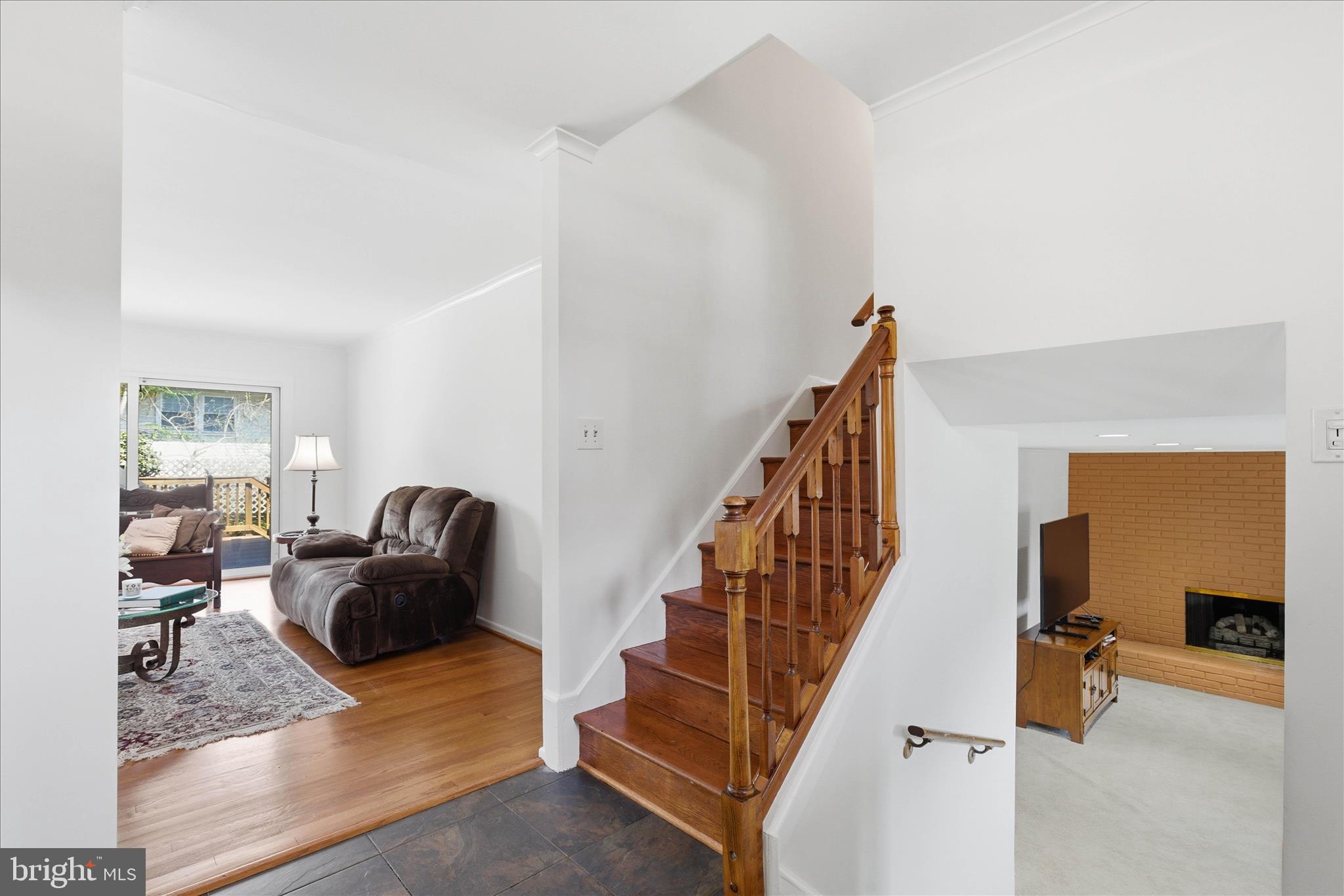 2510 Swift Run Street Vienna, VA 22180 - Photo 22 of 42 a living room with furniture and a couch