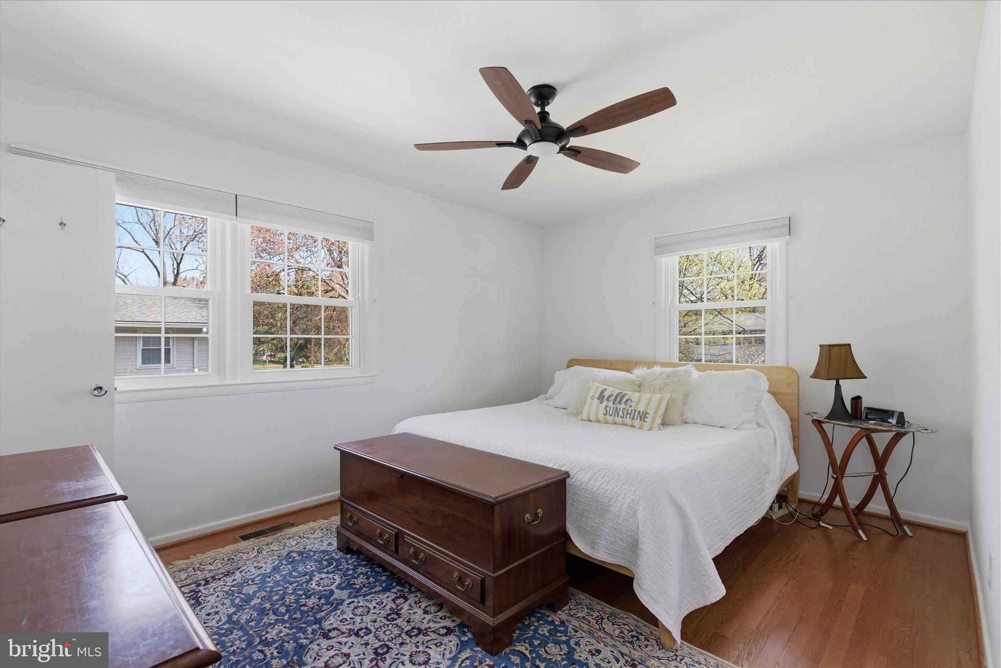2510 Swift Run Street Vienna, VA 22180 - Photo 23 of 42 a bedroom with a bed a table and chair