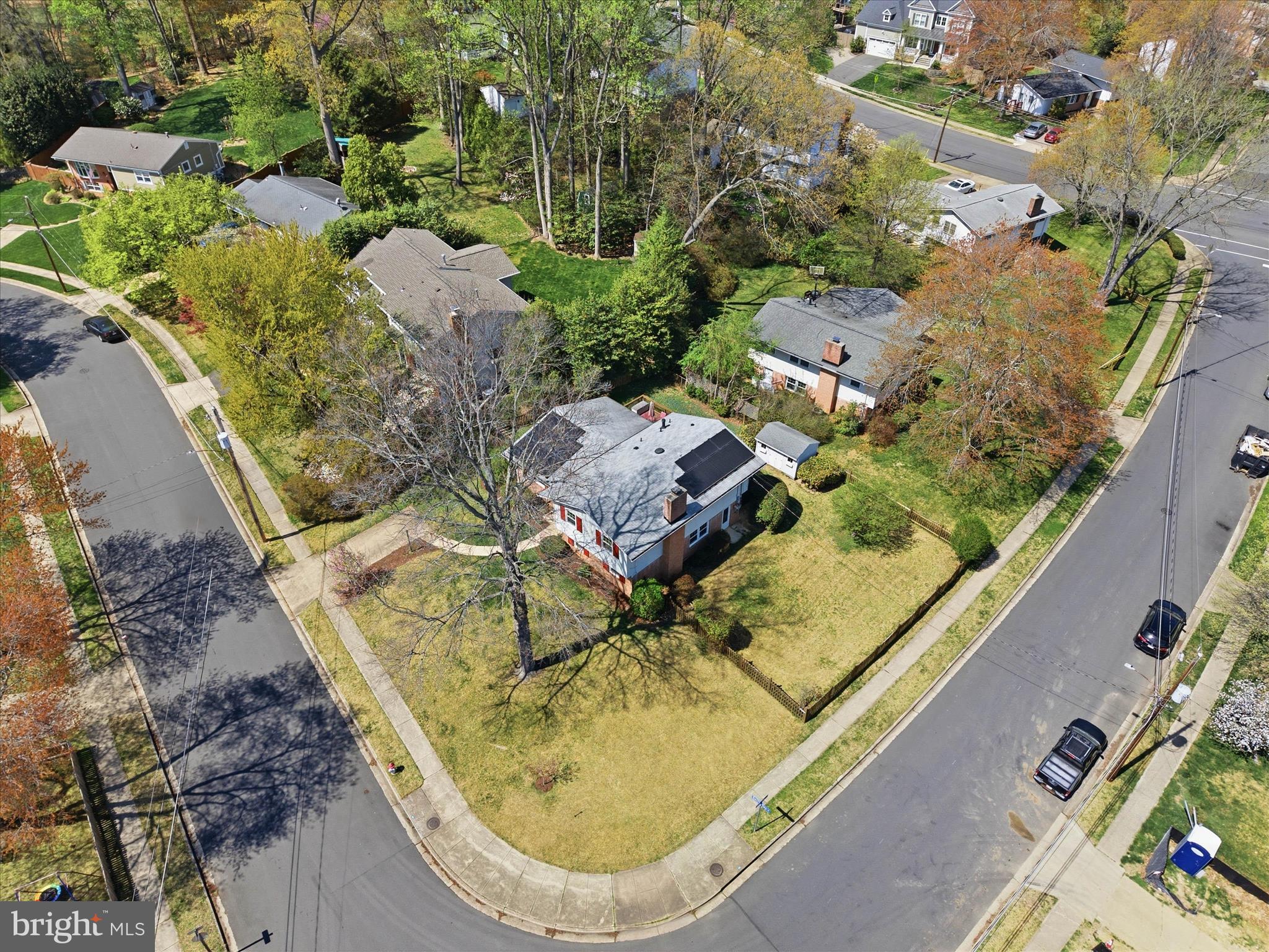 2510 Swift Run Street Vienna, VA 22180 - Photo 36 of 42 an aerial view of a house with outdoor space and a lake view