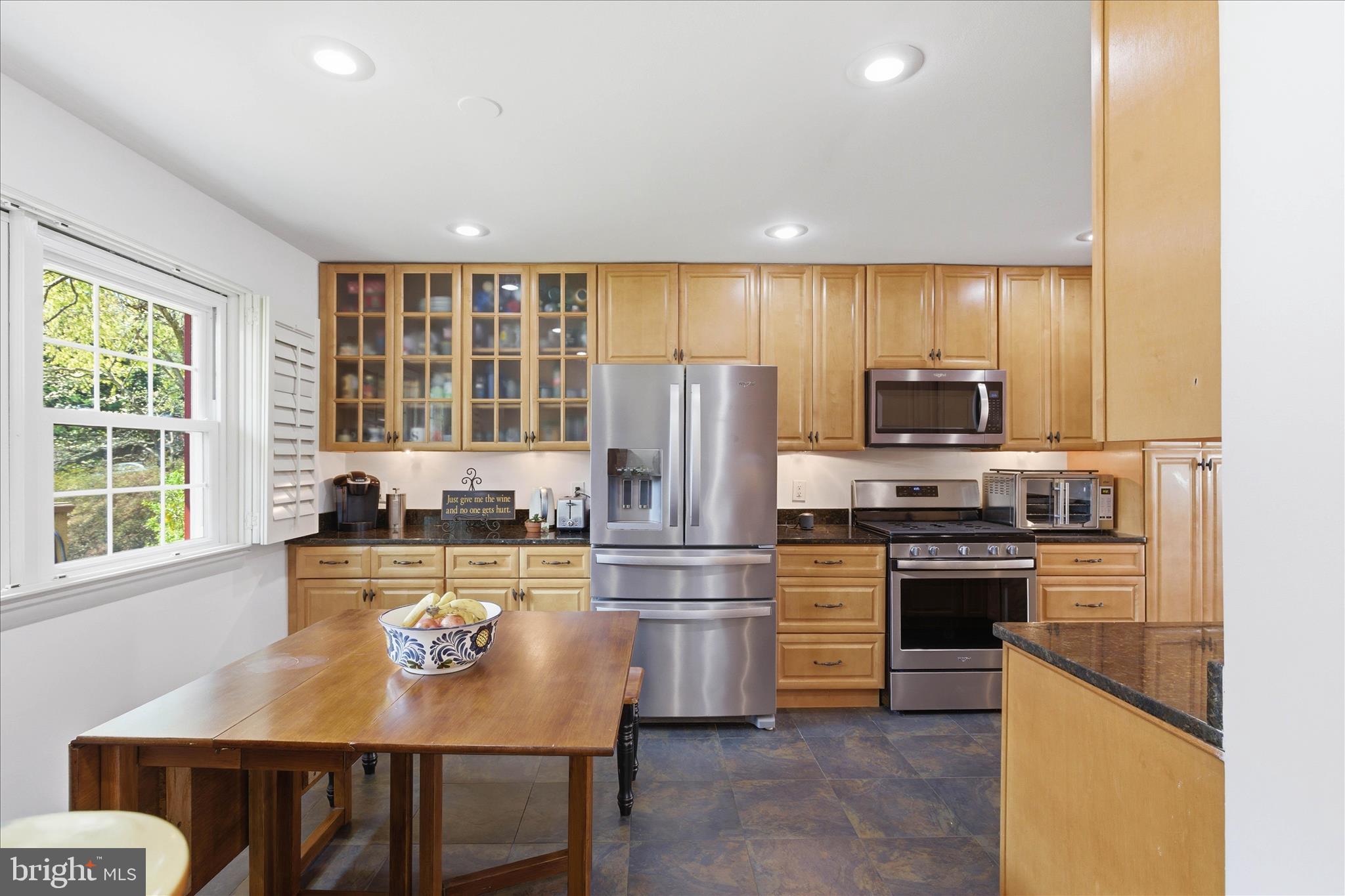 2510 Swift Run Street Vienna, VA 22180 - Photo 10 of 42 a kitchen with a stove a sink and a refrigerator