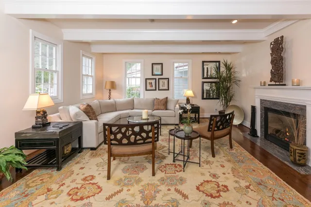 a bath tub sitting in a bathroom next to a window