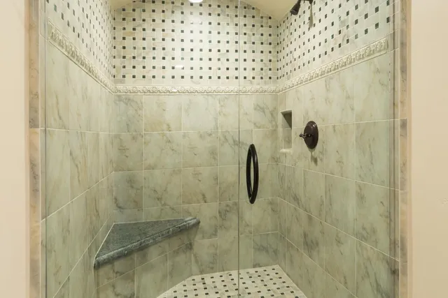 a view of a chairs and table in the patio