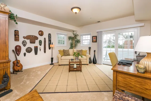 a view of a lake with a house in the background