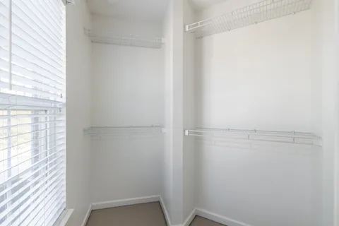 a view of a room with racks on the wall