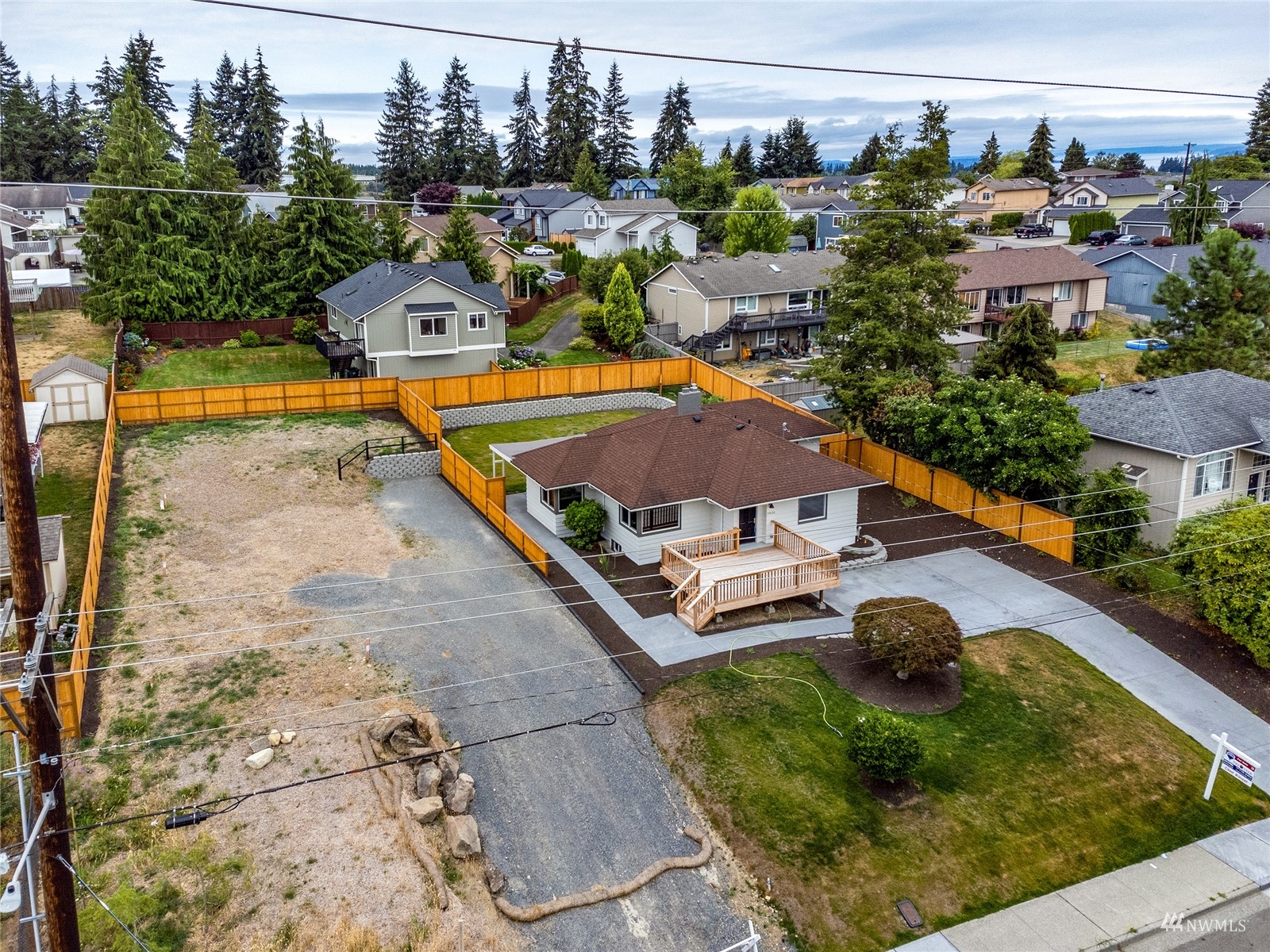 7420-lot #2 Upper Ridge Road Everett, WA 98203 - Photo 4 of 7 an aerial view of a house with swimming pool and outdoor seating