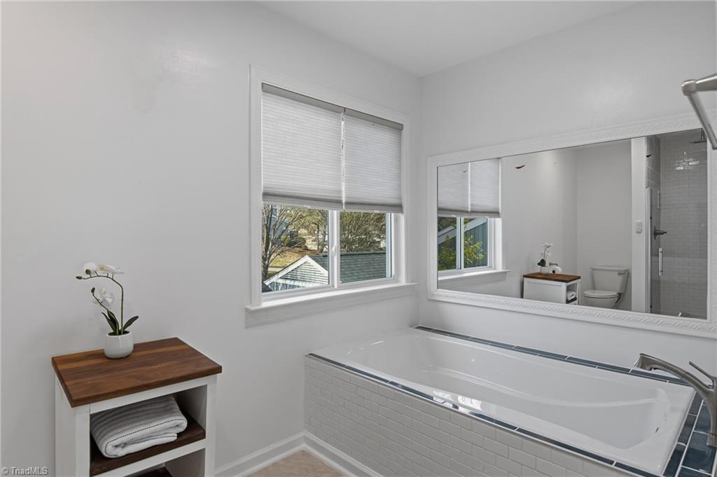 154 Pembrooke Ridge Court Advance, NC 27006 - Photo 26 of 36 Primary full bathroom with tub and shower