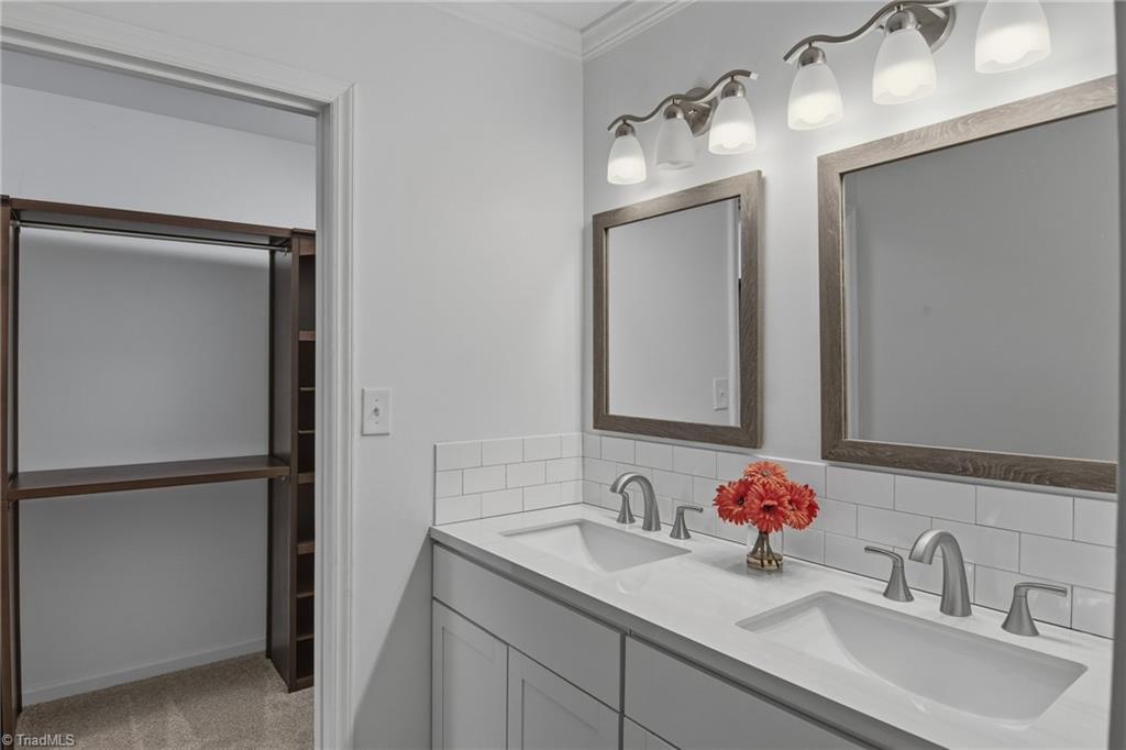 154 Pembrooke Ridge Court Advance, NC 27006 - Photo 28 of 36 Primary bathroom leading to walk in closet