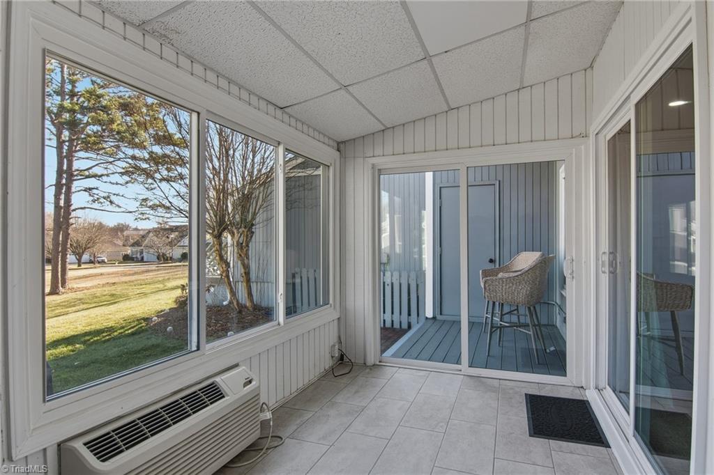 154 Pembrooke Ridge Court Advance, NC 27006 - Photo 9 of 36 Sunroom leads to small deck and storage room