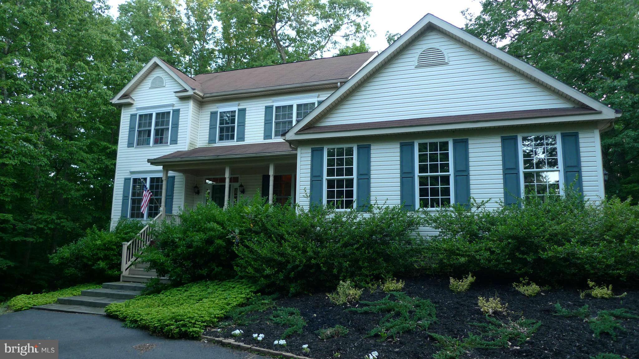 3366 Basford Road Frederick, MD 21703 - Photo 2 of 30 a front view of a house with garden