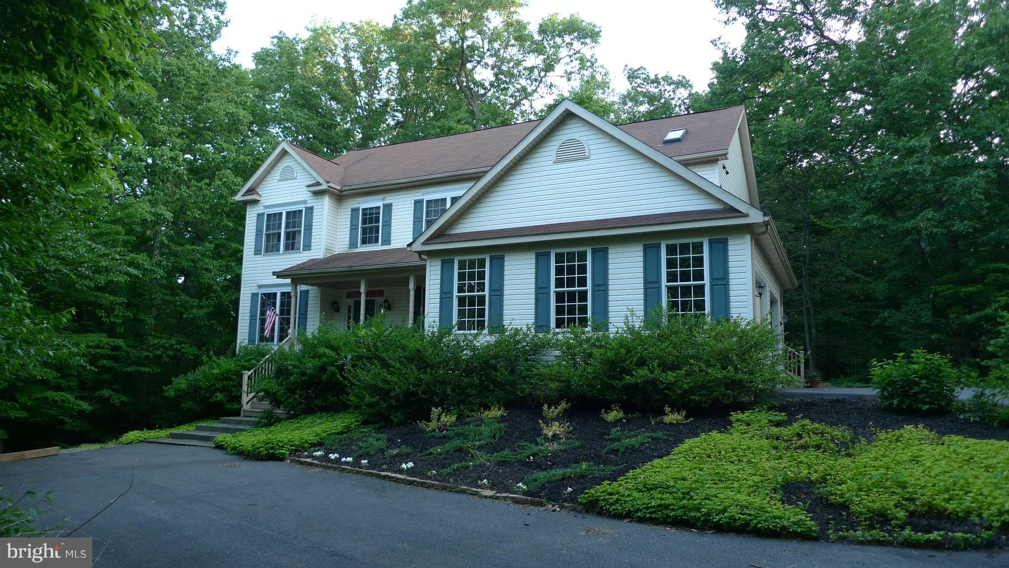 3366 Basford Road Frederick, MD 21703 - Photo 3 of 30 a front view of a house with a yard