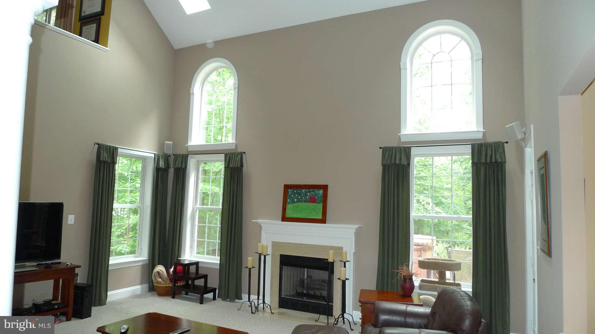 3366 Basford Road Frederick, MD 21703 - Photo 22 of 30 a view of a livingroom with a fireplace window and outdoor space