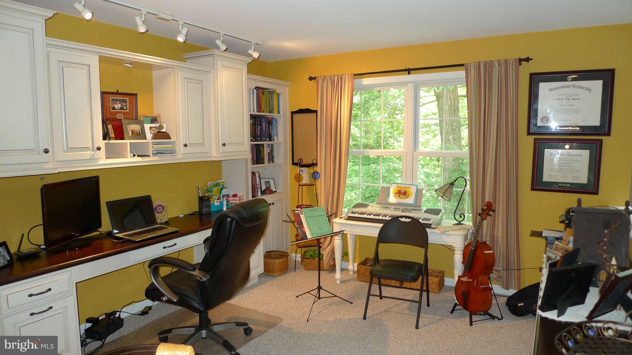 3366 Basford Road Frederick, MD 21703 - Photo 23 of 30 a view of a workspace with furniture and a window