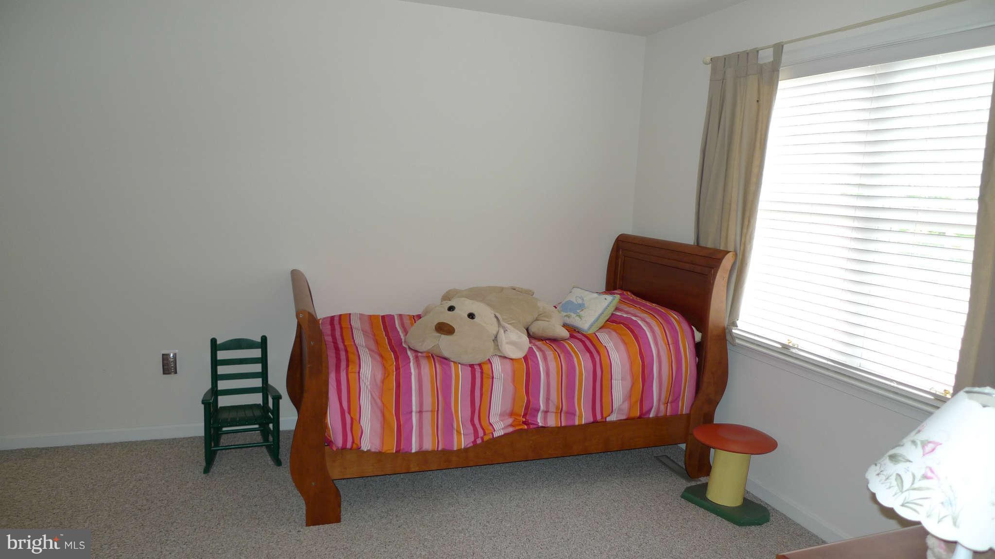 3366 Basford Road Frederick, MD 21703 - Photo 27 of 30 a bedroom with a bed and window