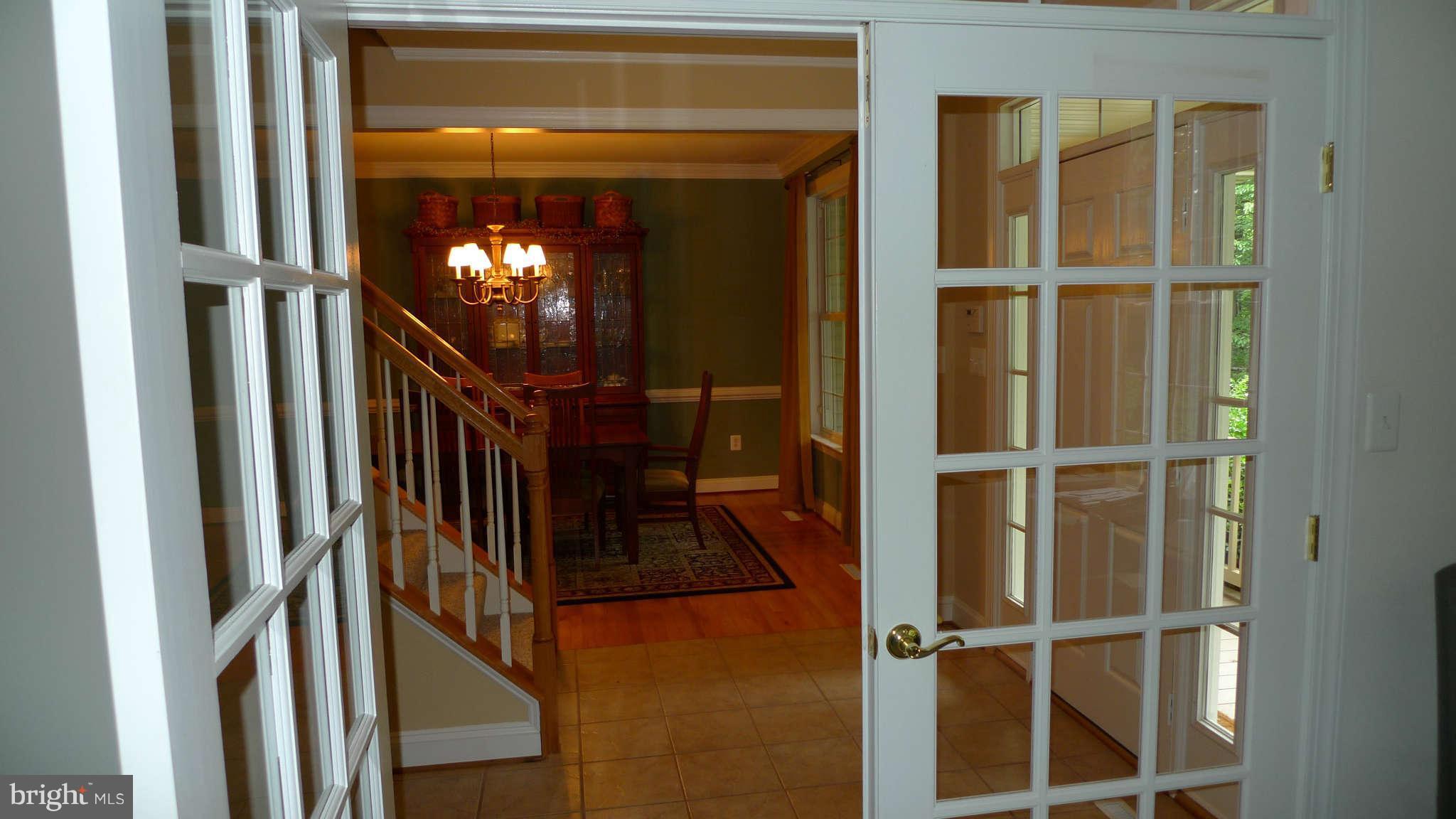 3366 Basford Road Frederick, MD 21703 - Photo 4 of 30 a view of a livingroom with stairs