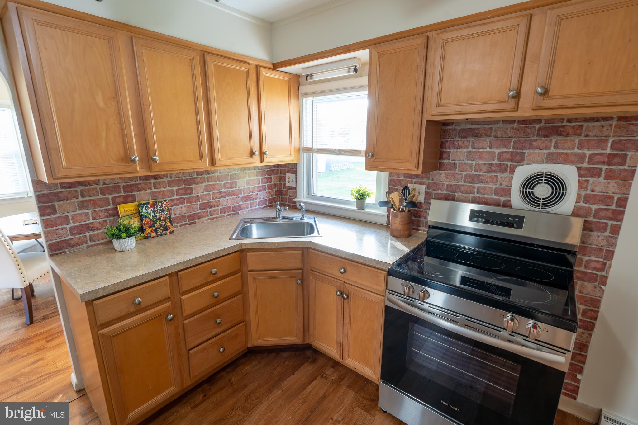 1110 Rohrerstown Road Lancaster, PA 17601 - Photo 17 of 35 a kitchen with sink cabinets and appliances