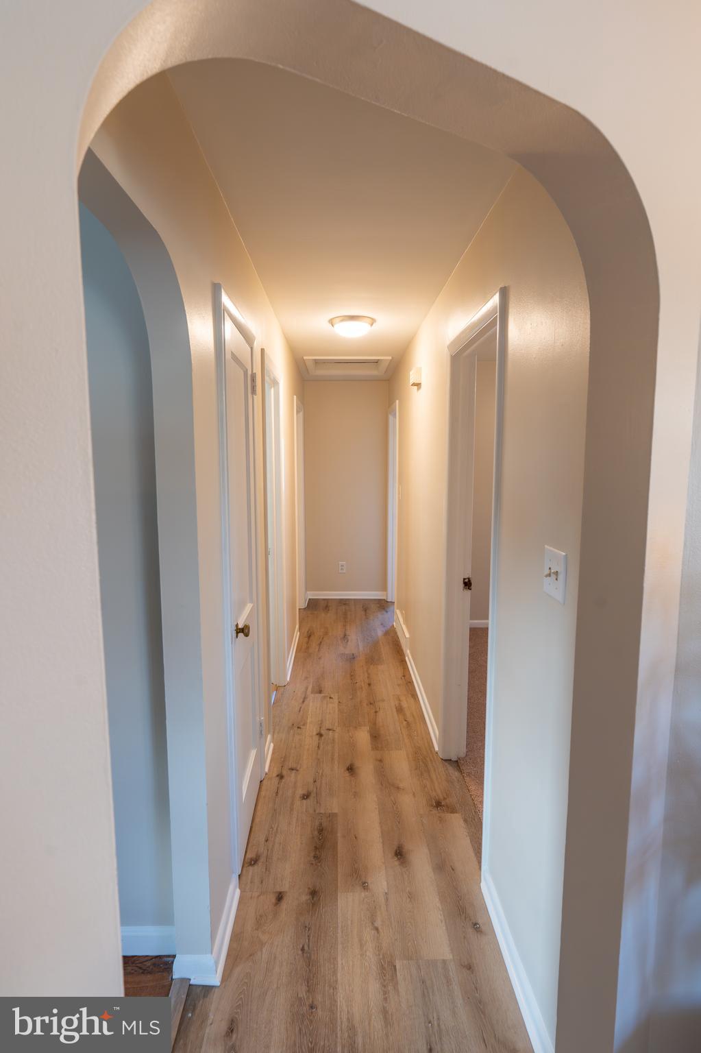 1110 Rohrerstown Road Lancaster, PA 17601 - Photo 19 of 35 a view of a hallway with wooden floor