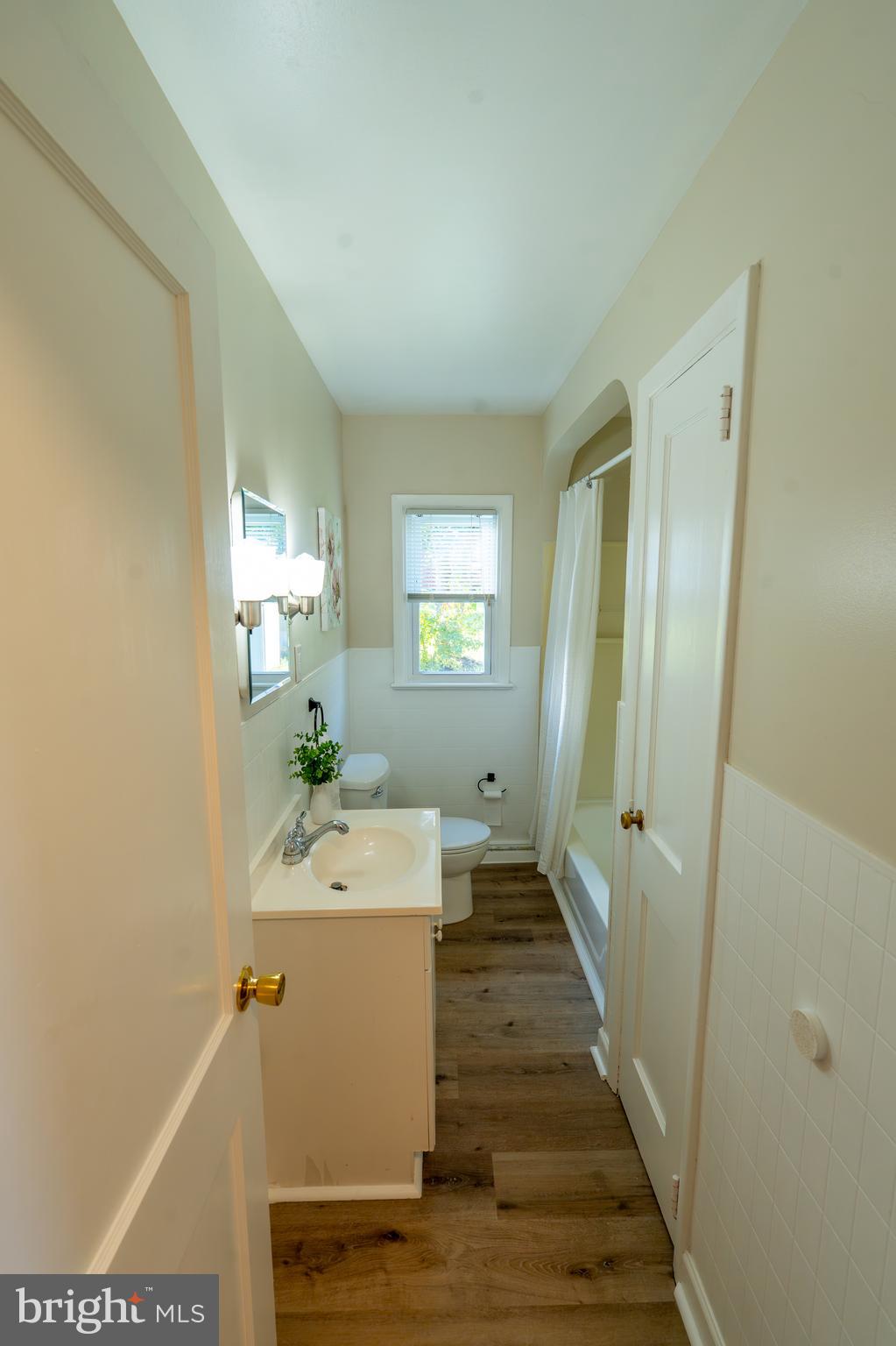 1110 Rohrerstown Road Lancaster, PA 17601 - Photo 22 of 35 a bathroom with a sink a mirror and a bathtub