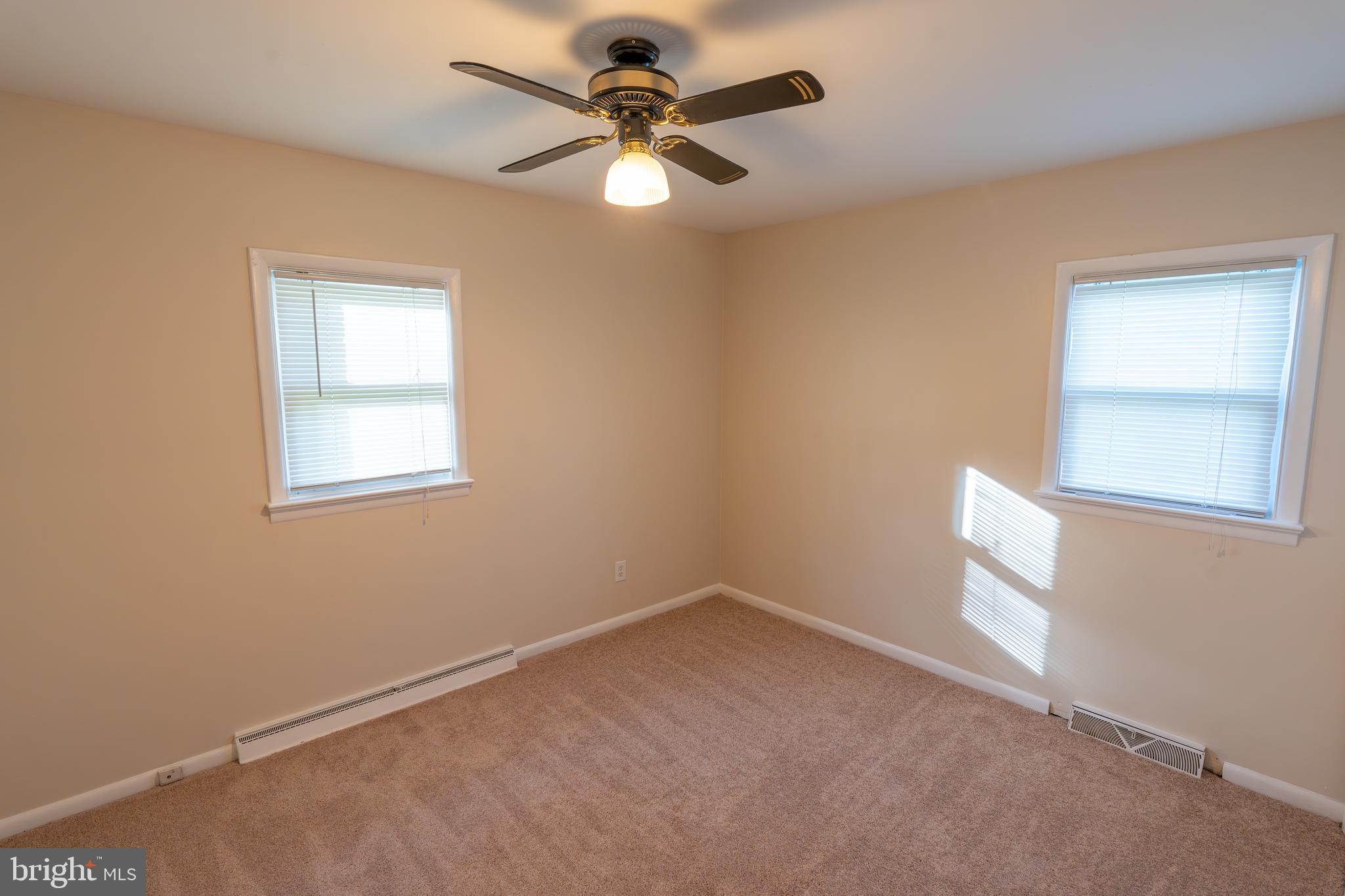 1110 Rohrerstown Road Lancaster, PA 17601 - Photo 24 of 35 an empty room with windows and fan