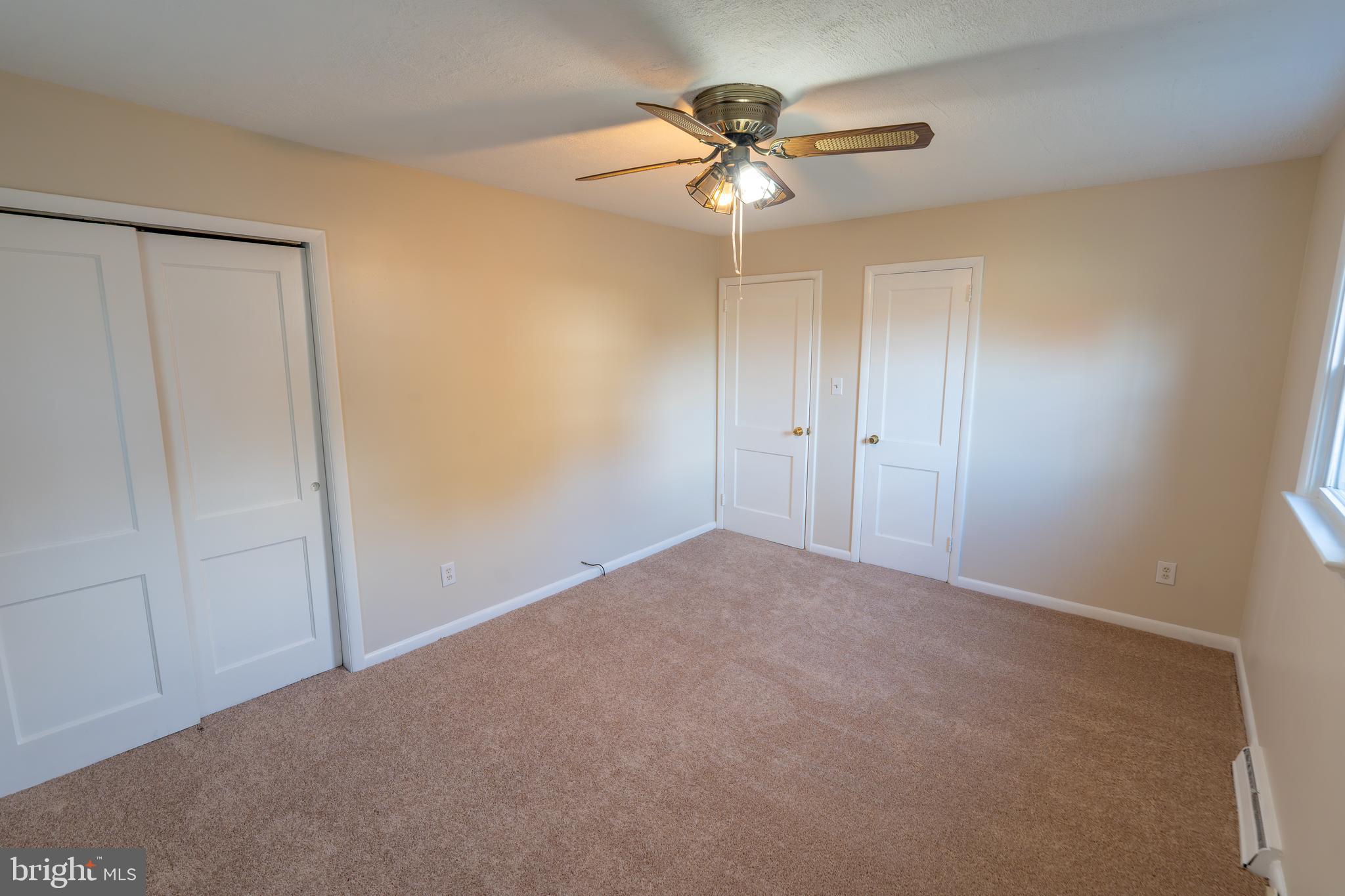 1110 Rohrerstown Road Lancaster, PA 17601 - Photo 27 of 35 a view of an empty room with a chandelier fan