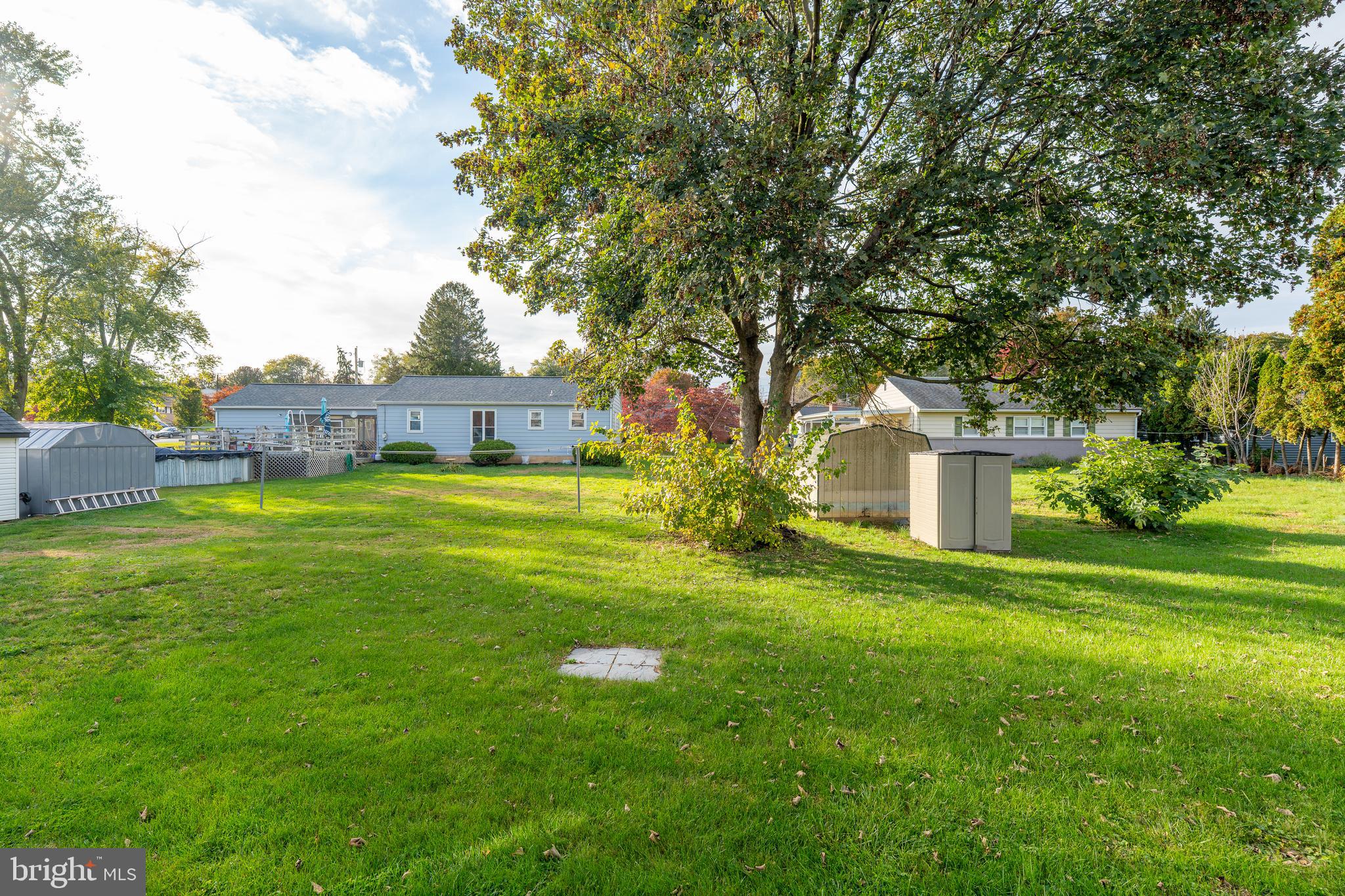 1110 Rohrerstown Road Lancaster, PA 17601 - Photo 35 of 35 a view of a house with a big yard potted plants and large tree