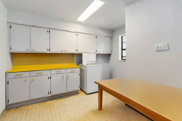 a room with storage and utility