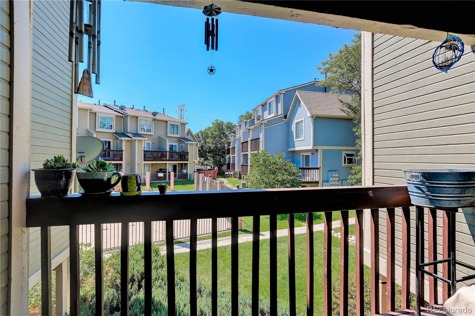 1885 South Quebec Way, Unit C15 Denver, CO 80231 - Photo 29 of 31 a street view from balcony