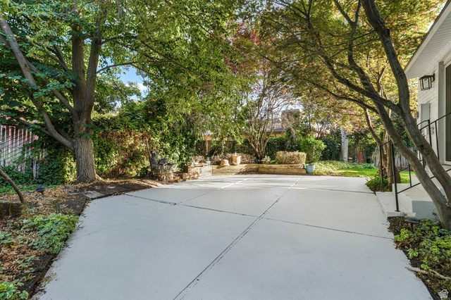 8965 Quail Run Drive Sandy, UT 84093 - Photo 31 of 56 Fenced backyard featuring a patio area
