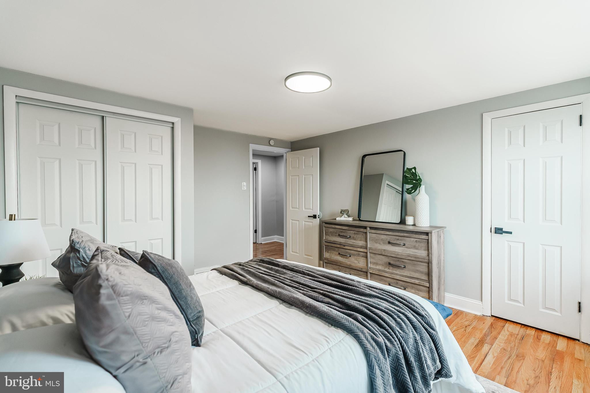 1620 Ashurst Road Philadelphia, PA 19151 - Photo 19 of 30 a bedroom with a bed and a dresser