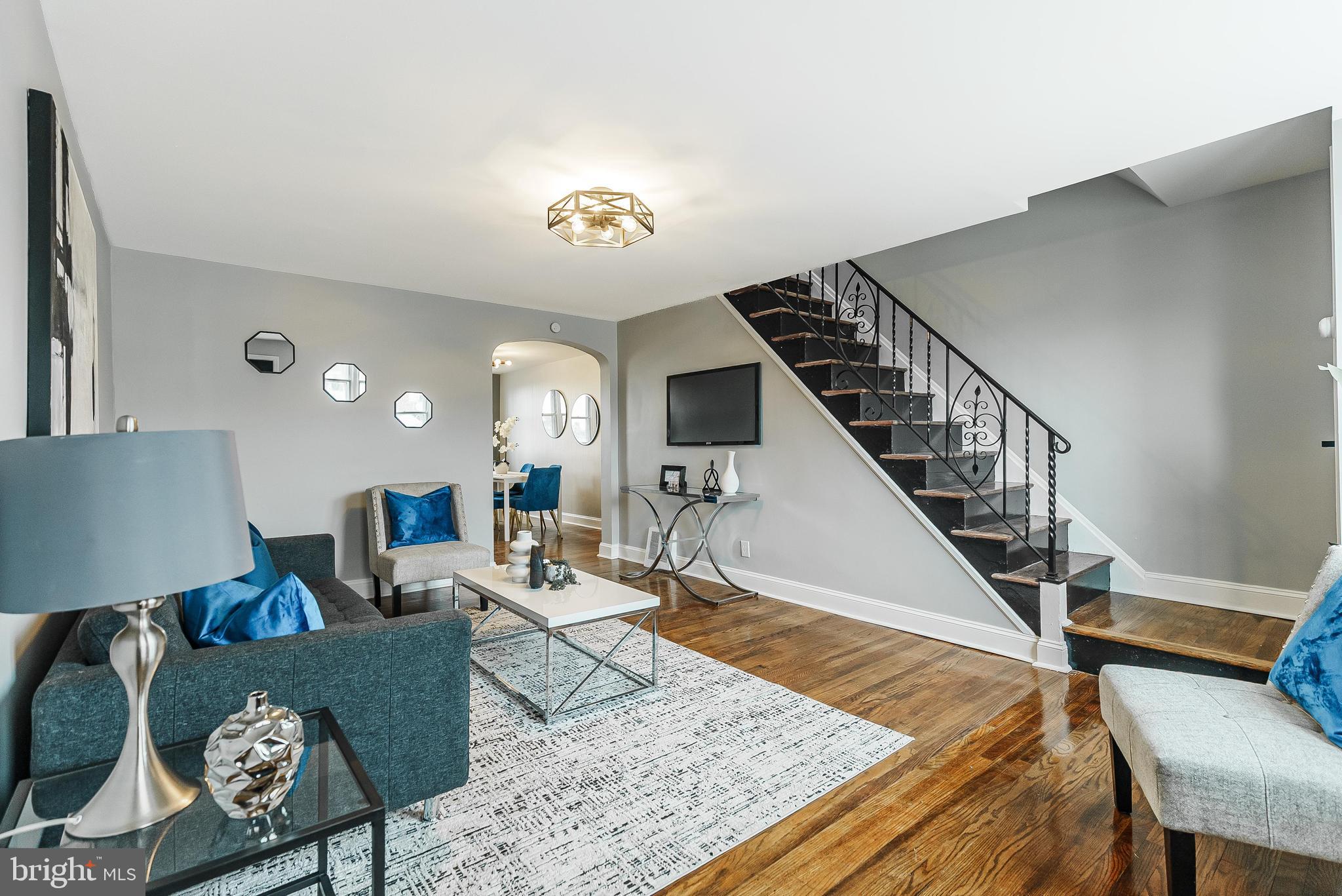 1620 Ashurst Road Philadelphia, PA 19151 - Photo 2 of 30 a living room with furniture and wooden floor