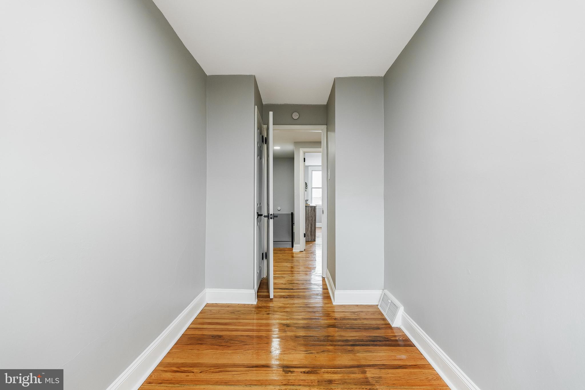 1620 Ashurst Road Philadelphia, PA 19151 - Photo 25 of 30 a view of a hallway with wooden floor