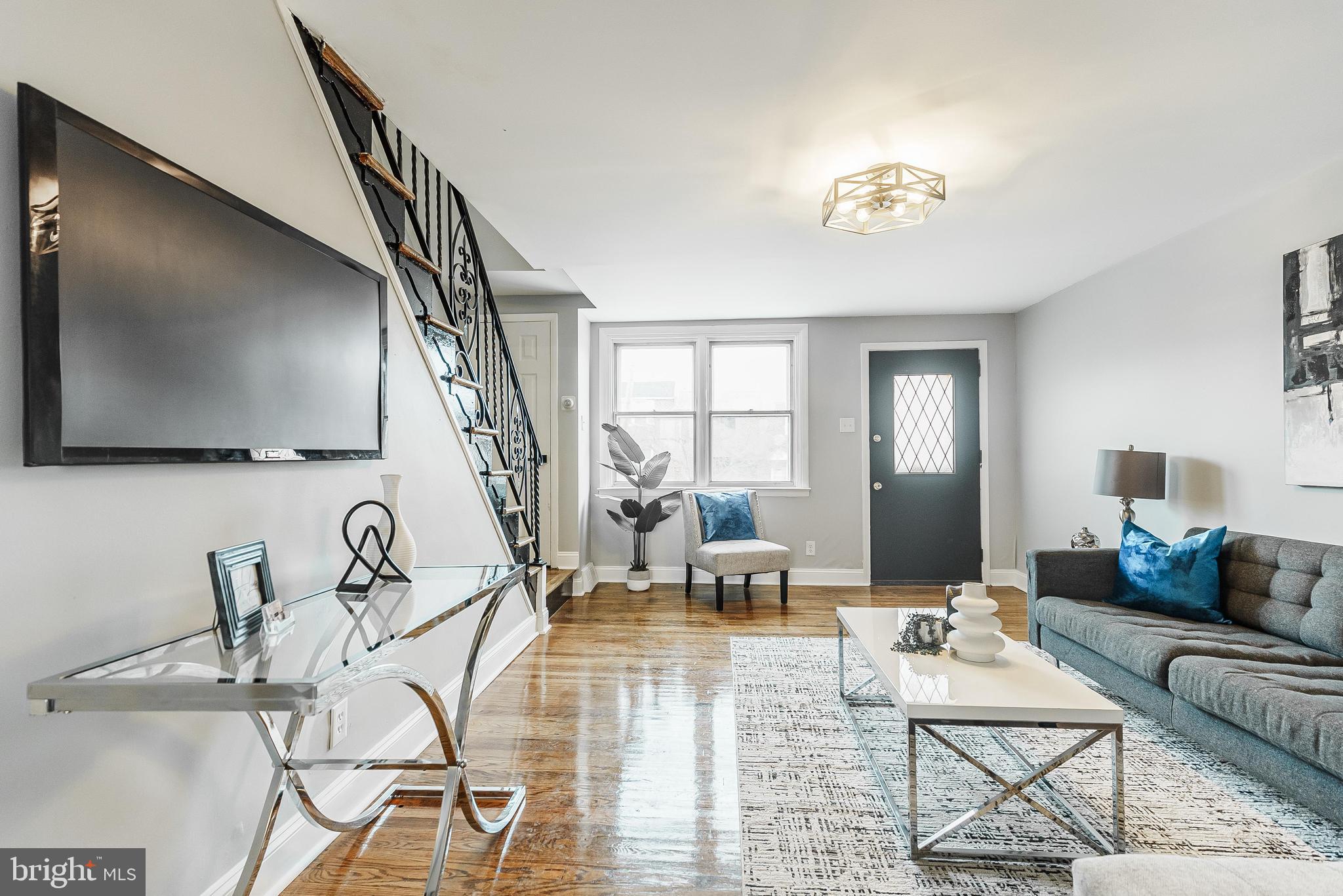 1620 Ashurst Road Philadelphia, PA 19151 - Photo 6 of 30 a living room with furniture and a flat screen tv