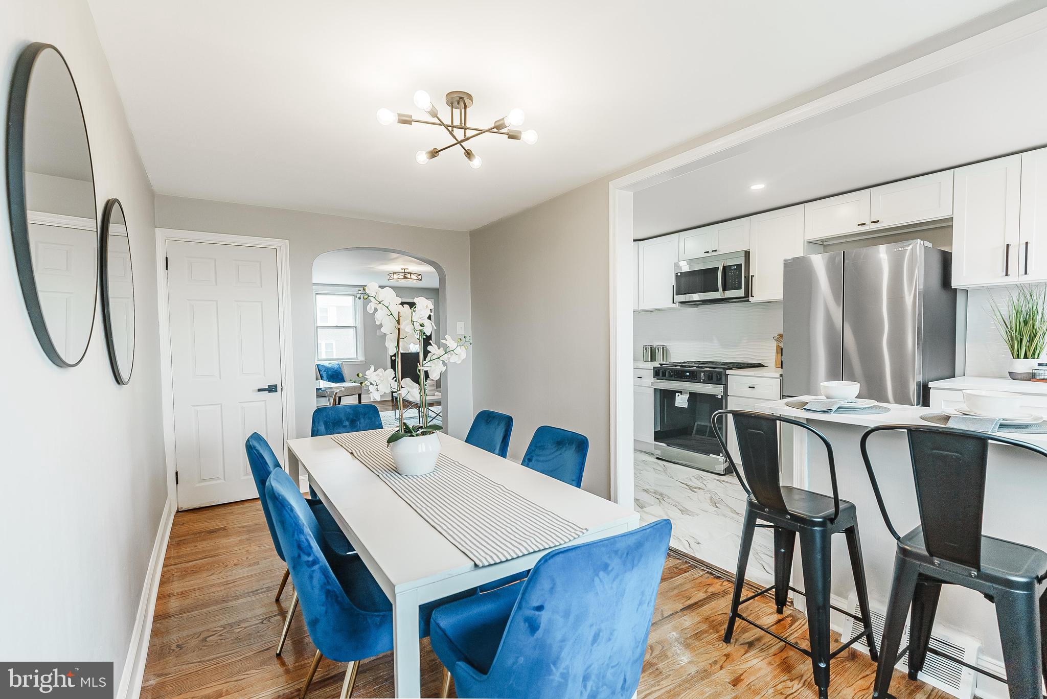 1620 Ashurst Road Philadelphia, PA 19151 - Photo 8 of 30 a view of a dining room with furniture and a chandelier