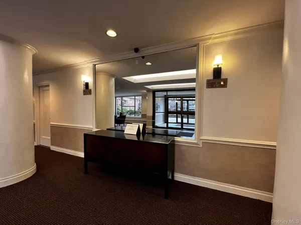 a view of a room with window and wooden floor