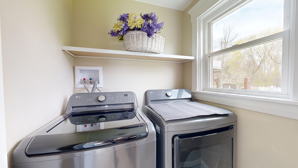 262 Plymouth Street, Unit 1 Bridgewater, MA 02324 - Photo 11 of 26 a kitchen with a stove and a sink