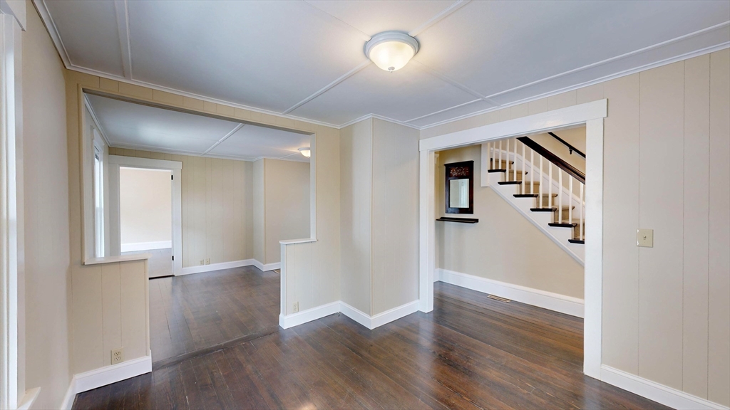 262 Plymouth Street, Unit 1 Bridgewater, MA 02324 - Photo 13 of 26 wooden floor in an empty room