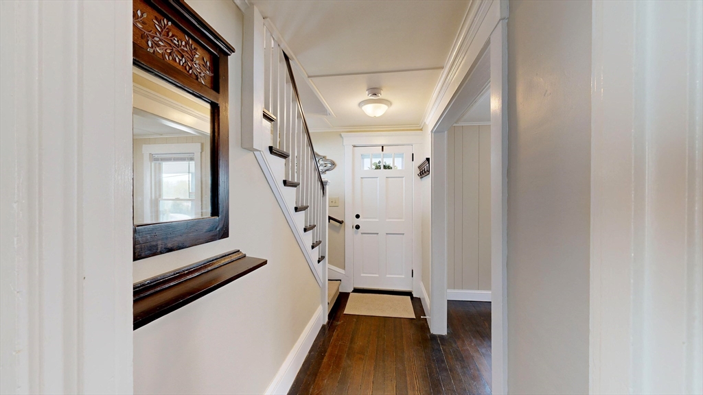262 Plymouth Street, Unit 1 Bridgewater, MA 02324 - Photo 17 of 26 a view of entryway and hall with wooden floor